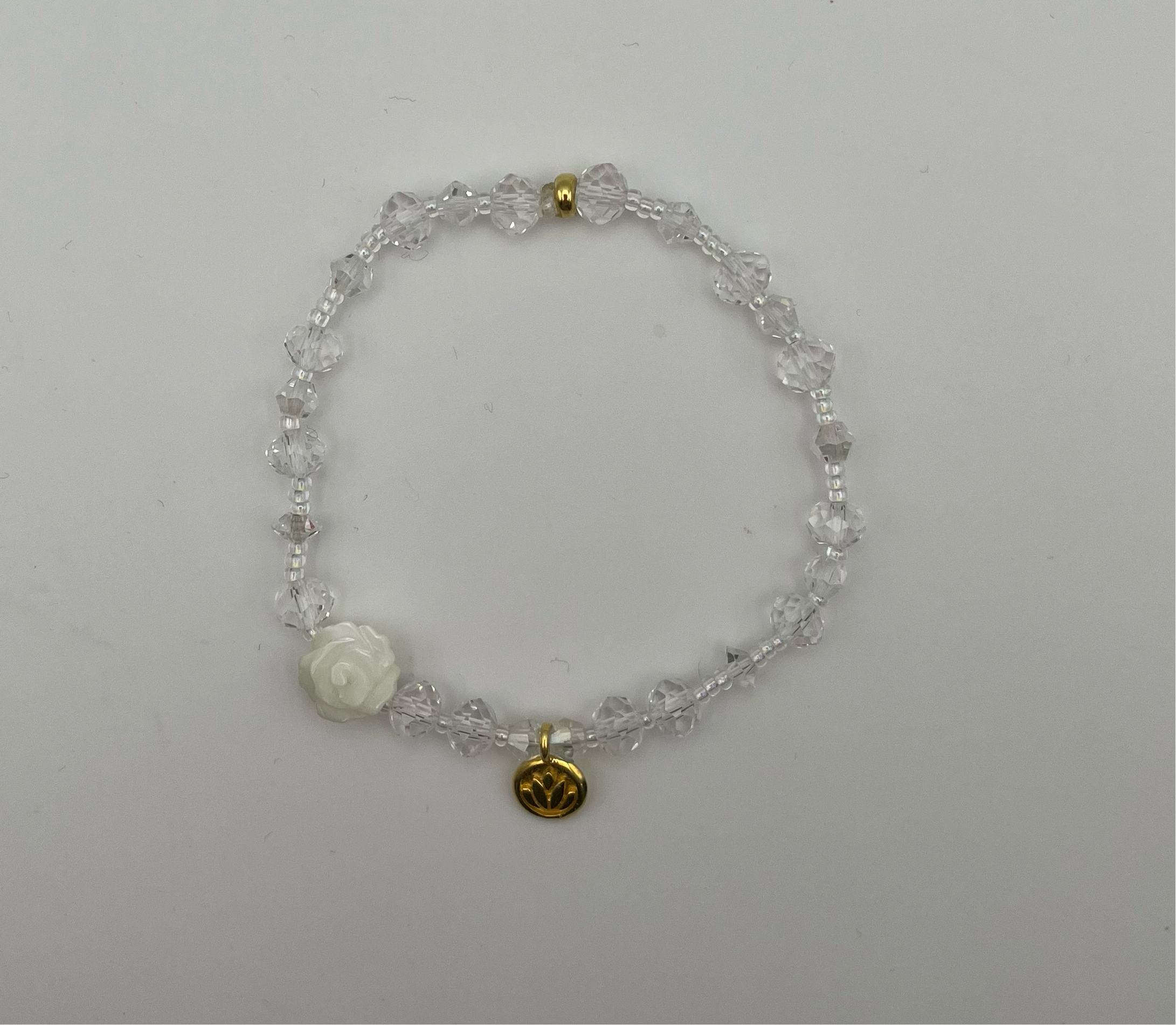 Flower and charm bracelet